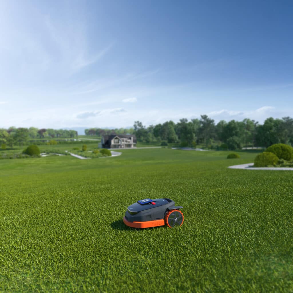 Configuration d'un robot tondeuse sur smartphone par un technicien AP Robots - Paramétrage personnalisé des zones, hauteurs et horaires pour une tonte autonome et précise.